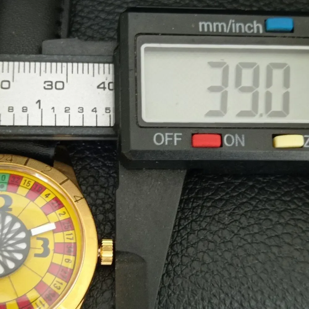 Vintage 1979 Roulette Manual Mens Gold Watch W/Leather Strap & Red/Yellow accent